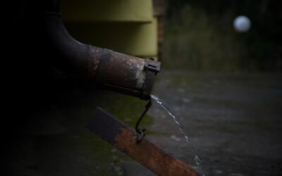 How Clogged Gutters Destroy Roofs, Fascia, and Foundations in Rainy Climates